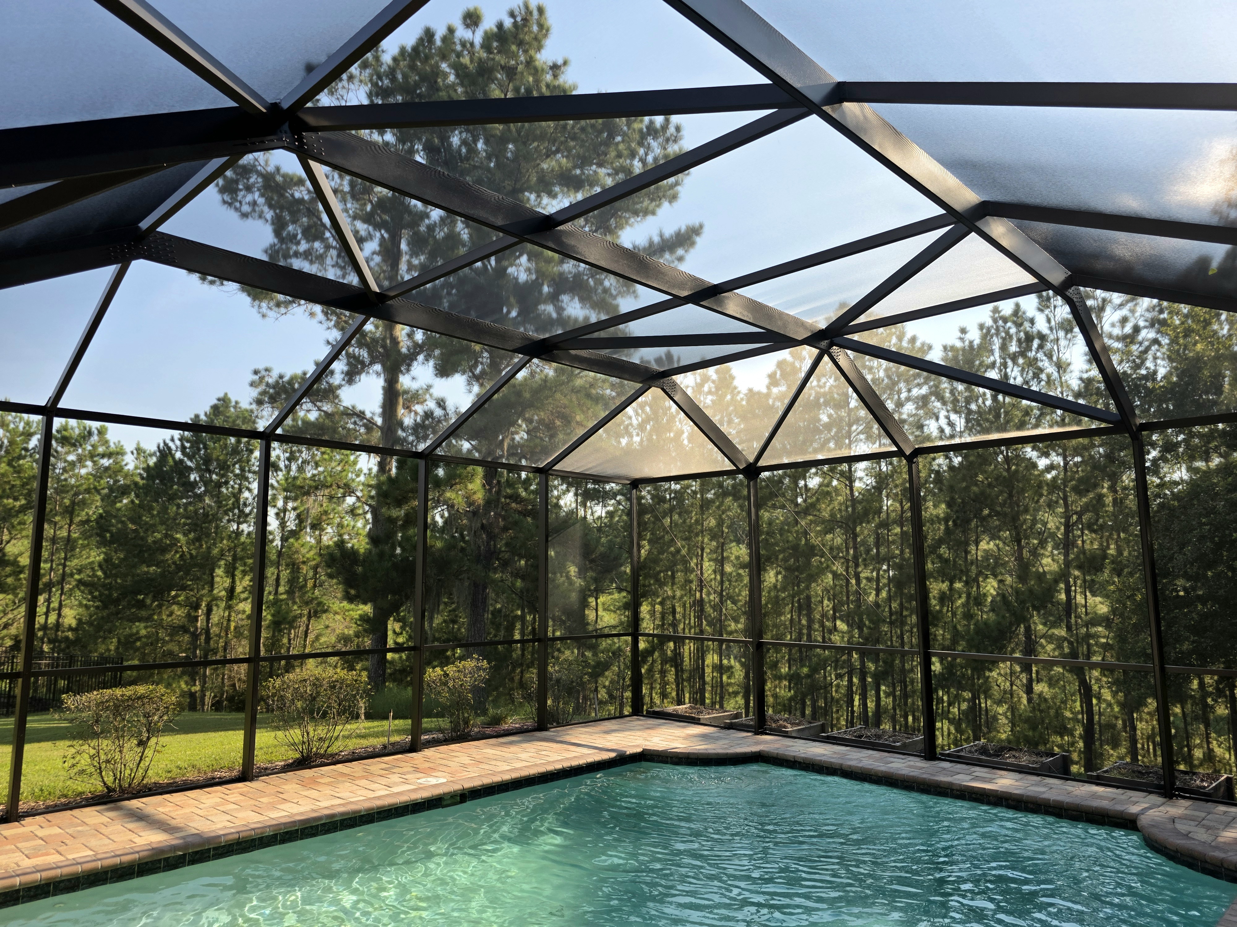 Screening Dunrite pool cage or lanai project photo — Decorating Your Lanai for Year-Round Florida Living