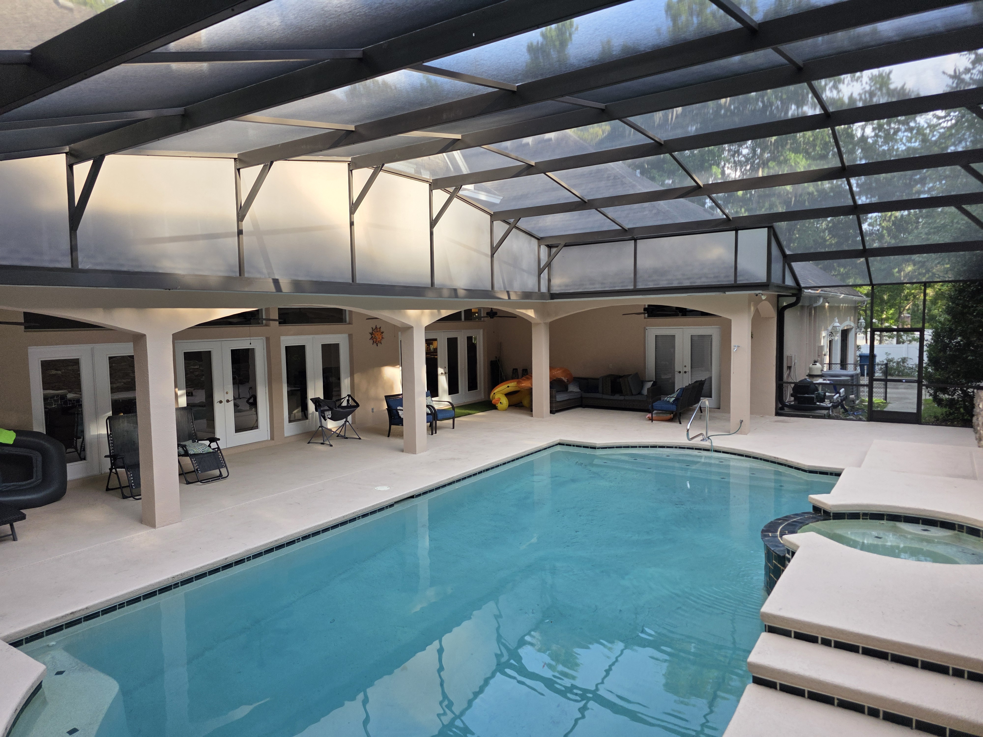 Screening Dunrite pool cage or lanai project photo — Outdoor Lighting Ideas for Pool Cages and Lanais (Without Attracting Bugs)