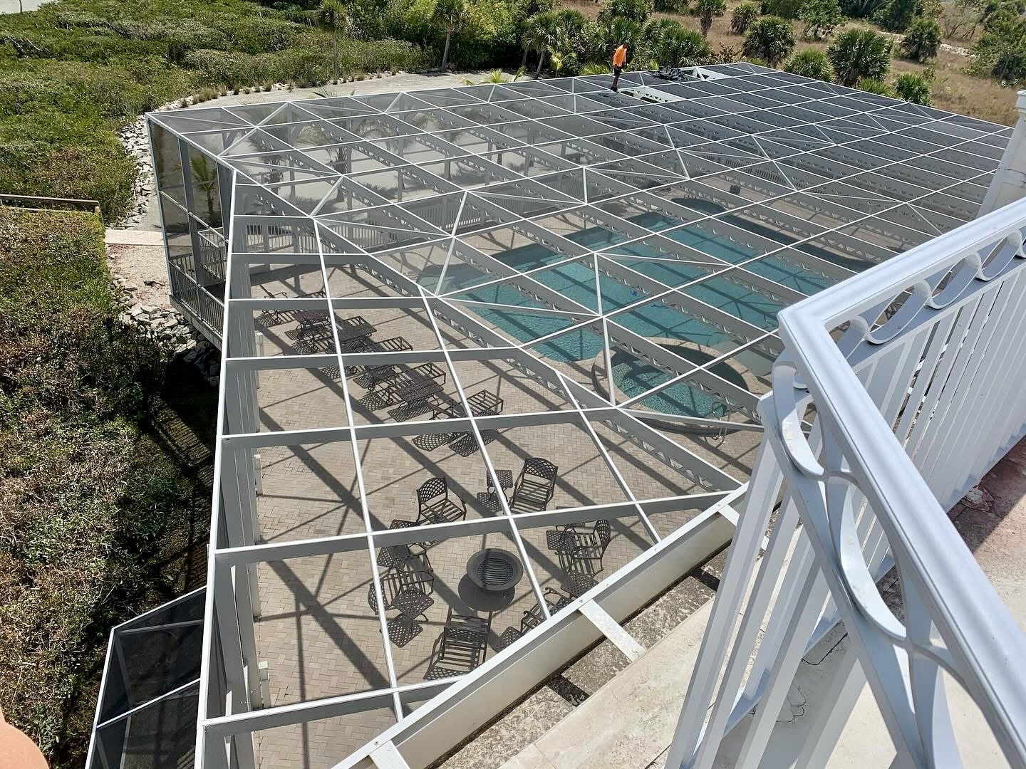 Screening Dunrite pool cage or lanai project photo — Outdoor Sound Systems for Patios: What Works Under a Screen Roof