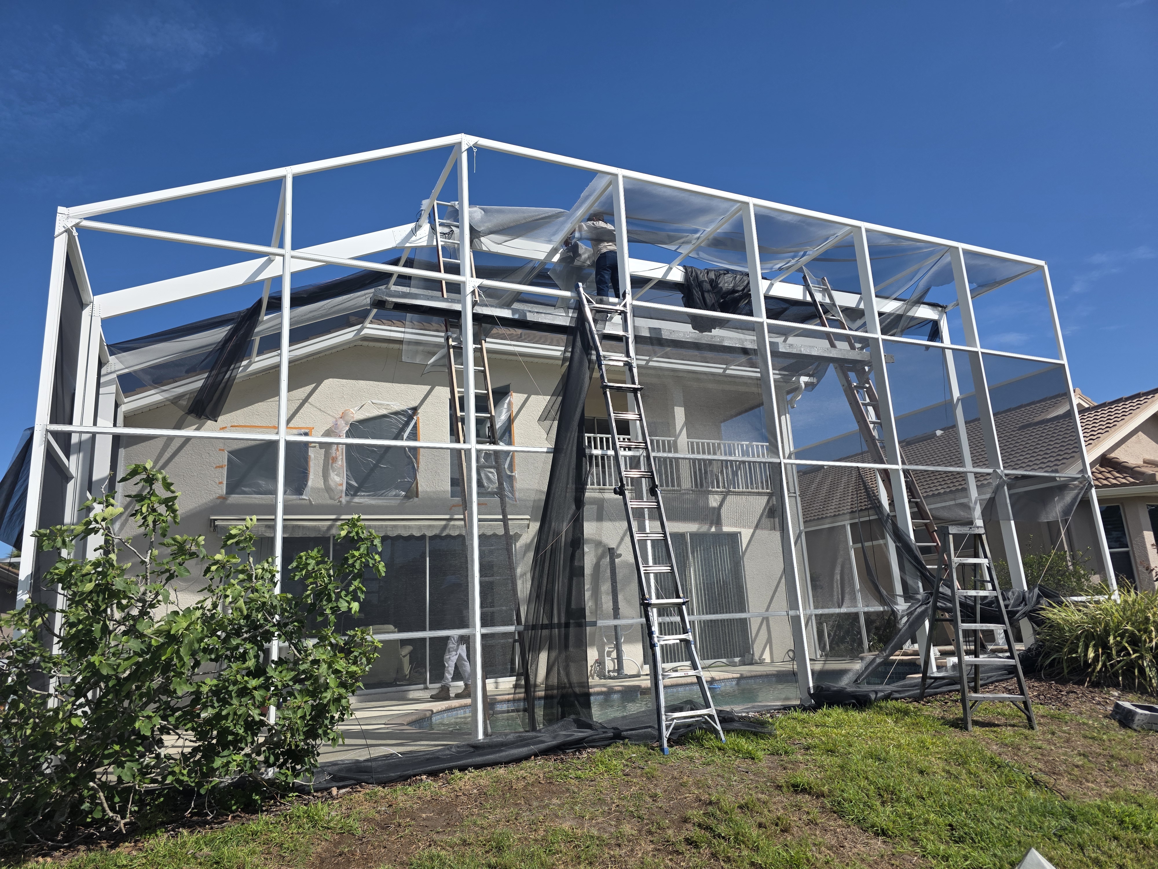Screening Dunrite pool cage or lanai project photo — When to Refinish vs Resurface Your Pool: A Homeowner Overview